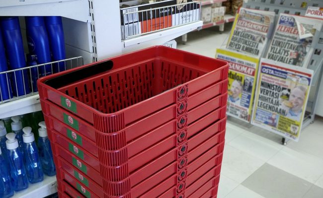 Red shopping baskets in market 20180227